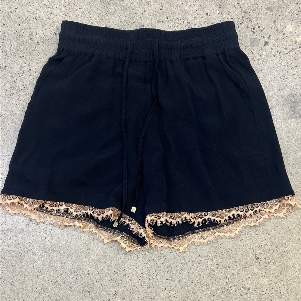 Elegant Black Shorts with Lace Trim